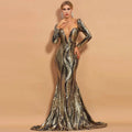 A gold and silver sequined mermaid gown with long sleeves and deep v-neckline perfect for waist slimming banquet evening dress