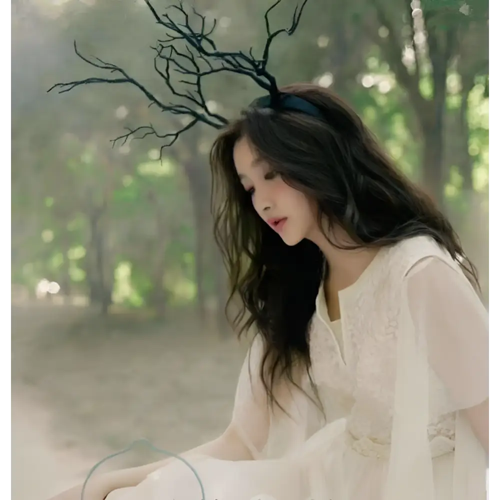 Gold branch fashion deer antler headband with gold-colored branch design and black elastic band for stylish wear