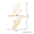 Gold-toned butterfly arm cuff with intricate cut-out detailing and small spherical accents for fashion personality trend