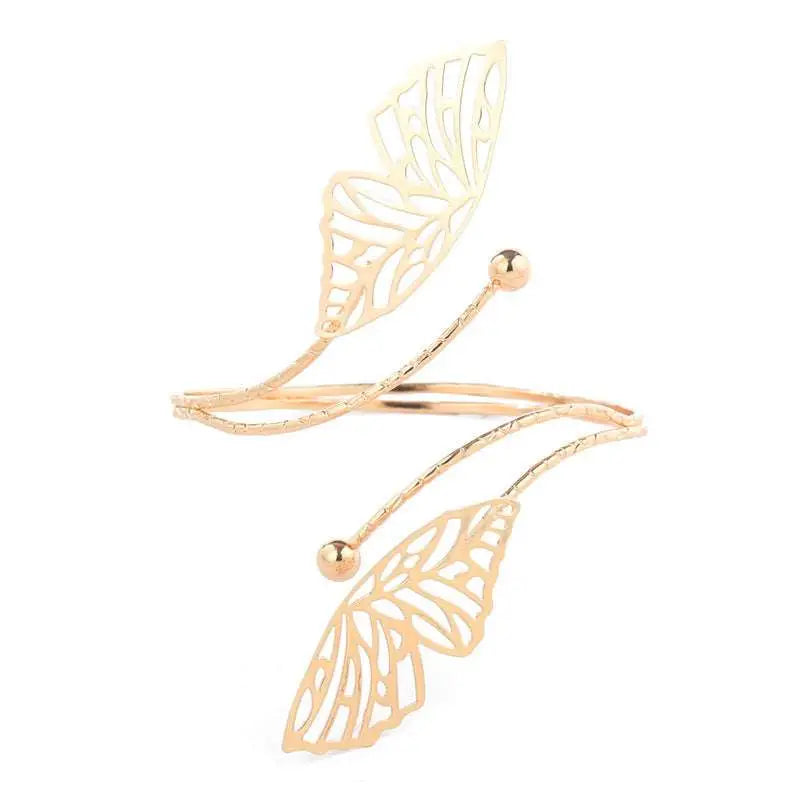 Gold-toned butterfly arm cuff with intricate cut-out detailing and small spherical accents for fashion personality trend