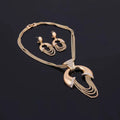 Gold electroplating alloy bridal jewelry set featuring a gold-toned necklace with crescent pendant and cascading chain strands