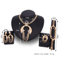 Gold electroplating alloy bridal jewelry set with gold-toned bold circular pendant and cascading chain strands with crystals
