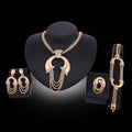 Gold electroplating alloy bridal jewelry set featuring a bold circular pendant with cascading chain strands and crystals