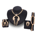 Gold electroplating alloy bridal jewelry set featuring a gold-toned necklace with cascading chain strands and crystal pendant