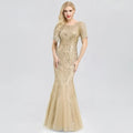 Gold embellished temperament mermaid dress featuring intricate sequin embroidery and sheer short sleeves