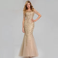 Gold embellished temperament mermaid dress featuring intricate sheer lace sleeves and a flowing tulle skirt