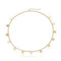 Gold-toned chain necklace with flat circular discs complementing the gold filigree pearl tassel headband hair accessory