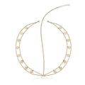 Gold filigree pearl tassel headband with gold-toned chain links and flat circular discs for elegant hair styling