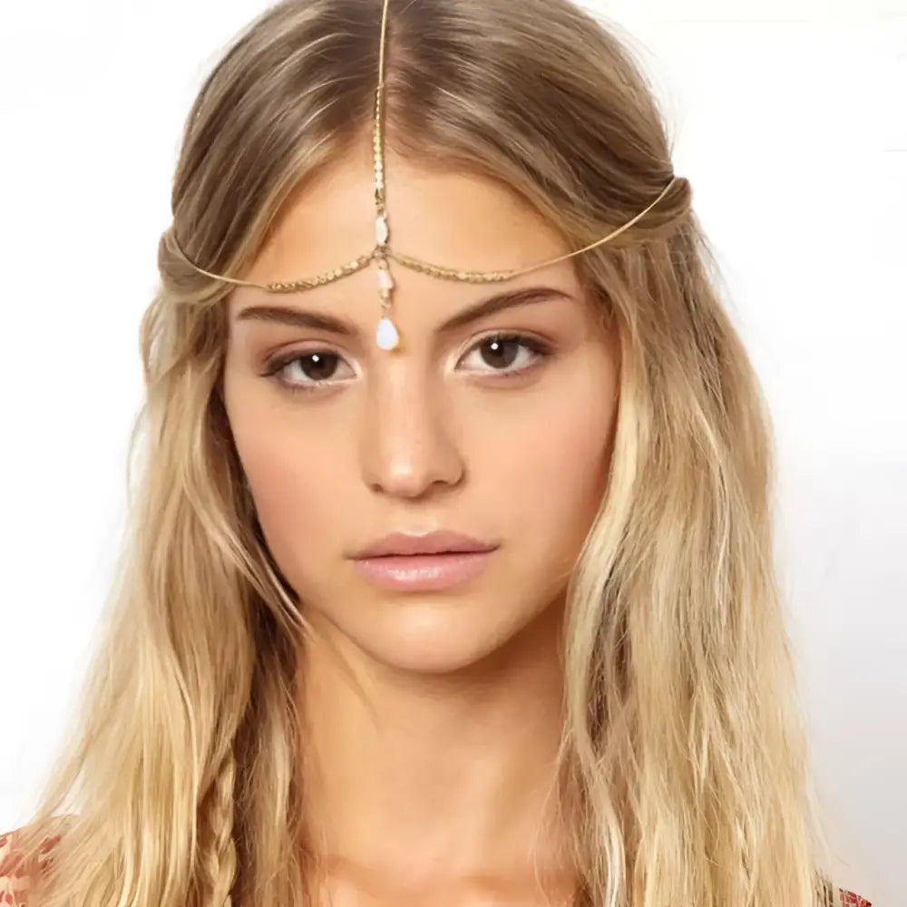 Gold filigree pearl tassel headband featuring a gold-toned chain with delicate white pearl tassel beads hair accessory