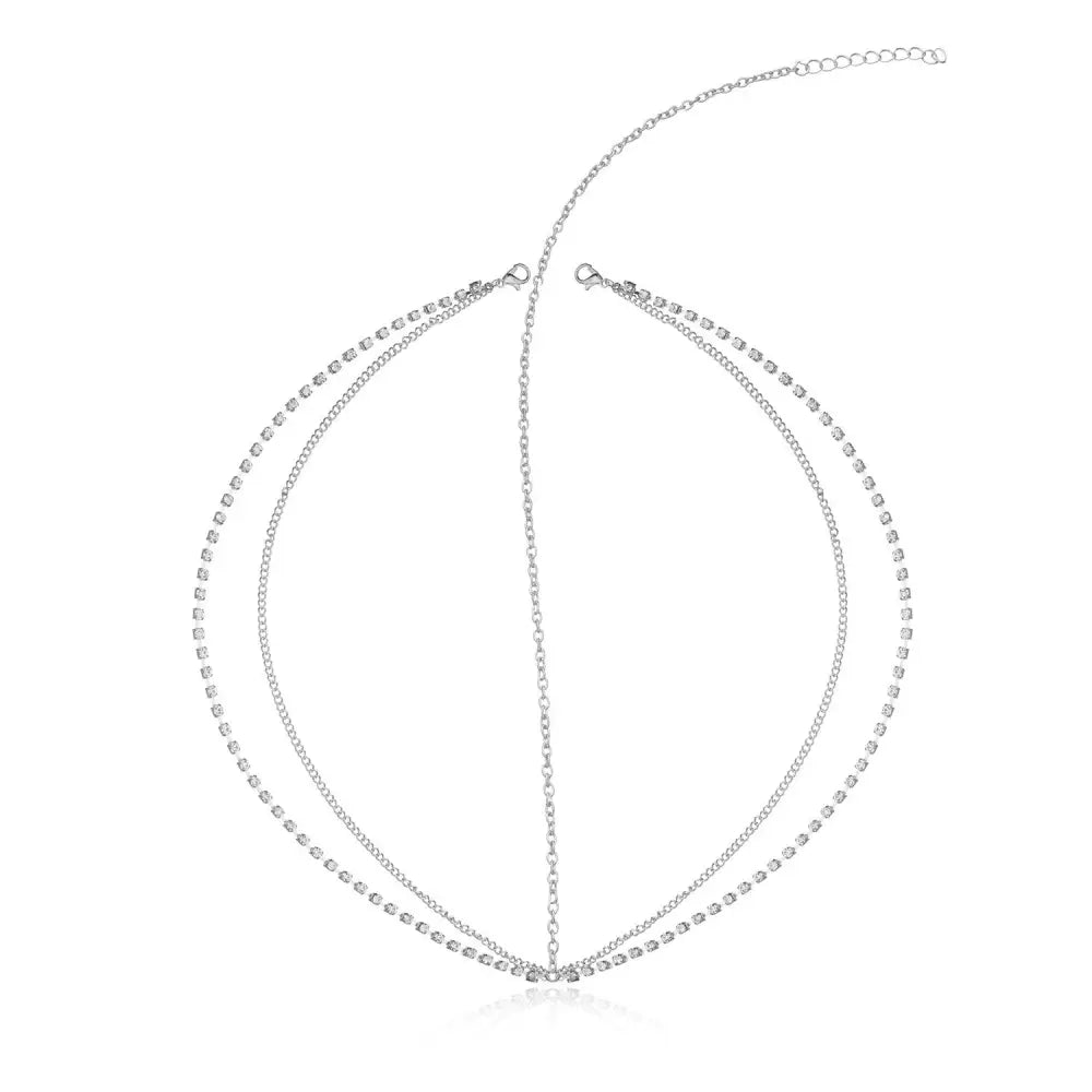 Silver rhinestone headband with delicate chain links and central clasp complementing pearl tassel headband hair accessories