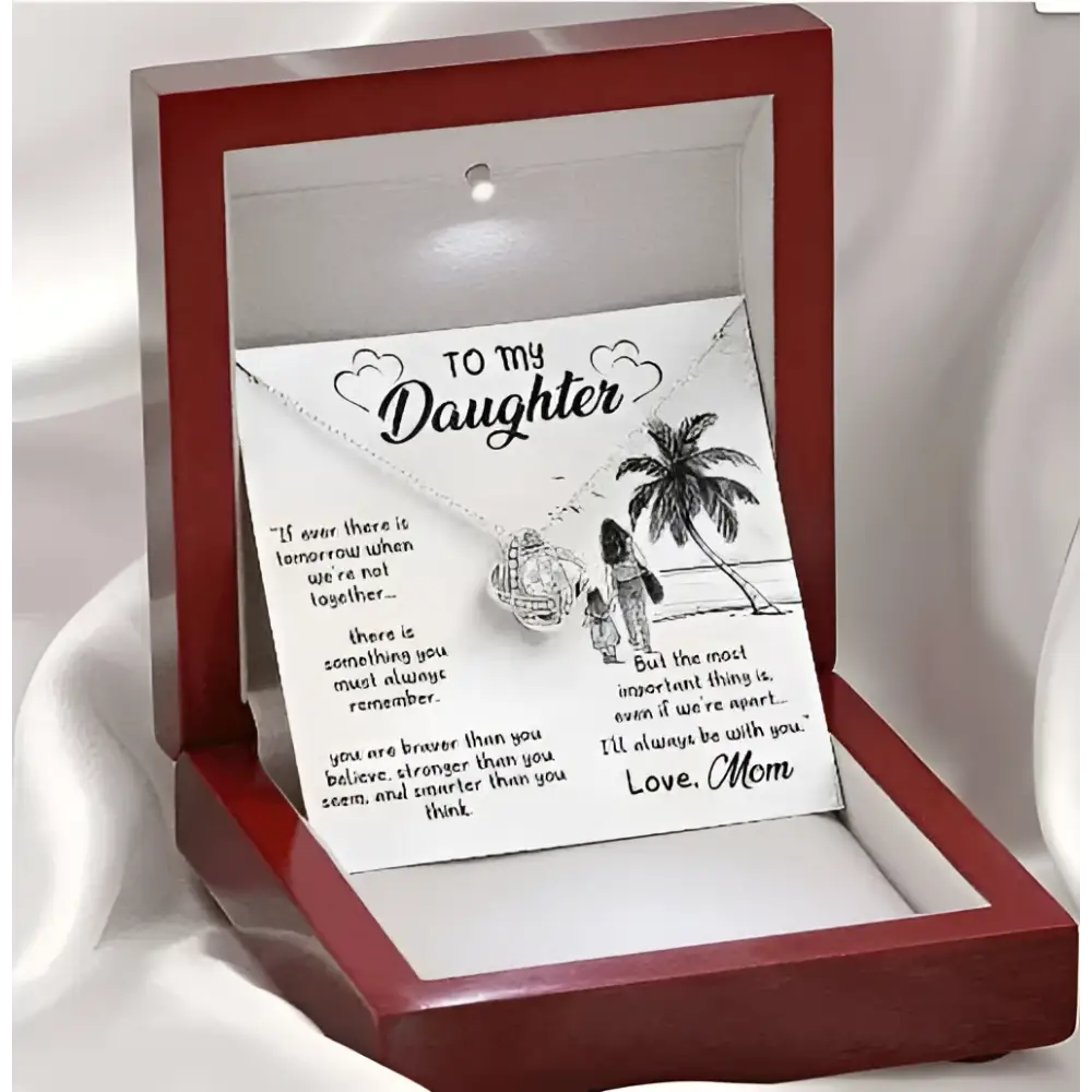 Silver heart-shaped pendant necklace with delicate chain in red gift box with engraved card for knot daughter’s love