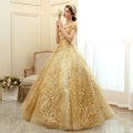 Gold floral solo performance off-the-shoulder ball gown with intricate floral embroidery and voluminous tulle skirt