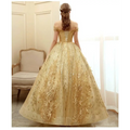 A shimmering gold floral solo off-the-shoulder performance costume tutu with intricate floral embroidery and tulle skirt