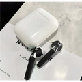White apple airpods with black silicone ear tips and a matching charging case featuring a custom sticker skin