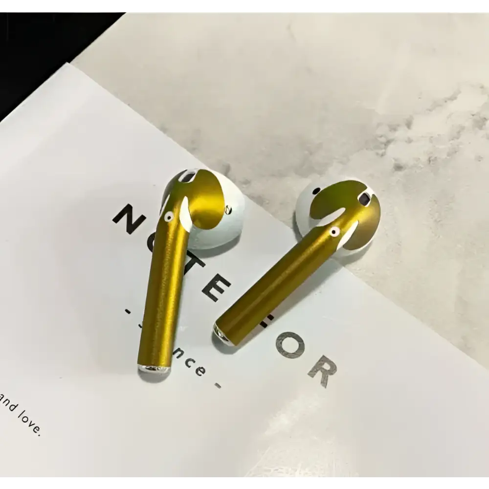 Gold glossy custom sticker skin apple airpods 2 wireless earbuds with white accents and matching charging case