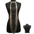 Gold layered body chain jewelry long necklace featuring gold-toned layered body chain with cascading chains from halter top
