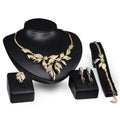 Gold leaf crystal bridal wedding jewelry set featuring gold leaf design with sparkling crystal accents for weddings