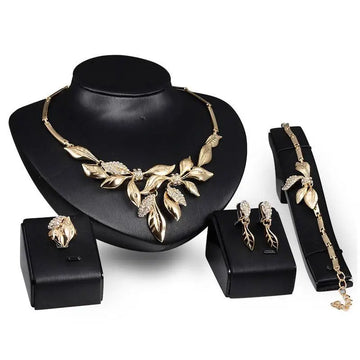 Gold leaf crystal bridal wedding jewelry set with gold leaf design and sparkling crystal accents for elegant occasions