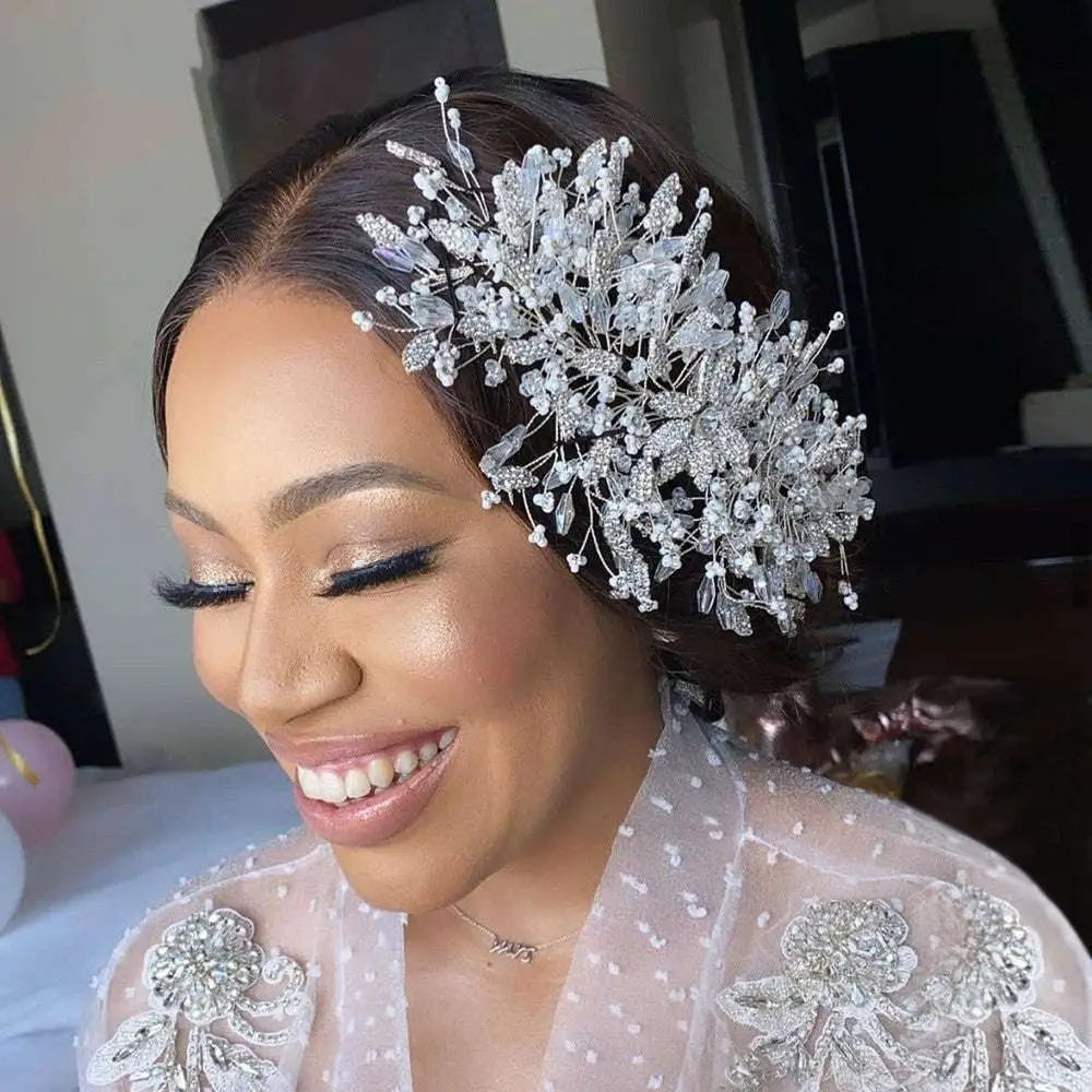 Gold luxurious exaggerated crystal leaf bridal headpiece with intricate clear crystal and gold branch design