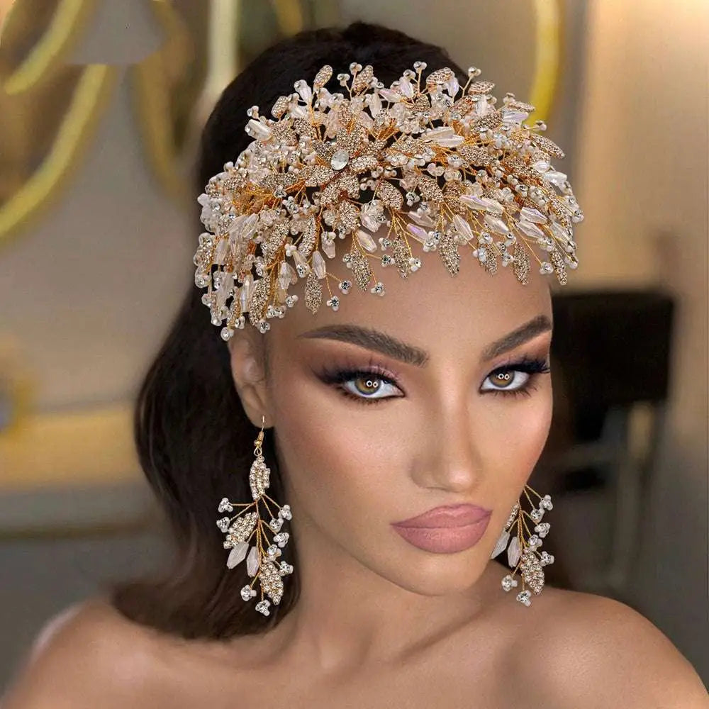 Gold luxurious exaggerated crystal leaf bridal headpiece with intricate clear crystal and gold branch design