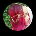 Gold multi layer tassel inlaid diamond head chain featuring a gold-toned chain with delicate dangling beads
