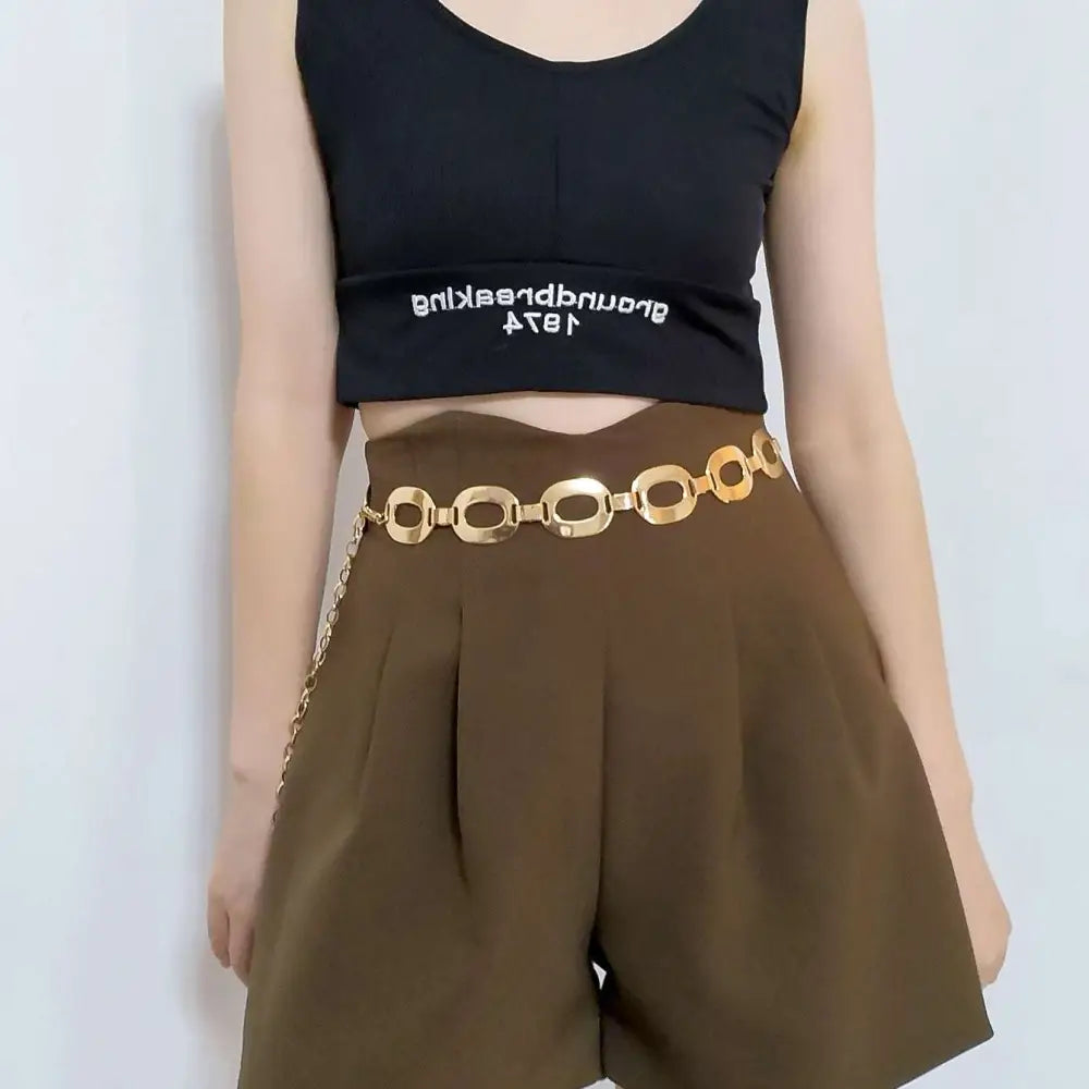 Gold-toned jewelry waist chain with interlocking oval links and matching dangling chain perfect for summer jewelry waist