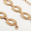 Gold-toned oval link jewelry waist chain with polished metallic finish and lobster clasp for summer jewelry waist wear