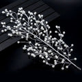 Silver wire outdoor hair comb adorned with small white pearls in a delicate gold pearl branch design for bride wedding