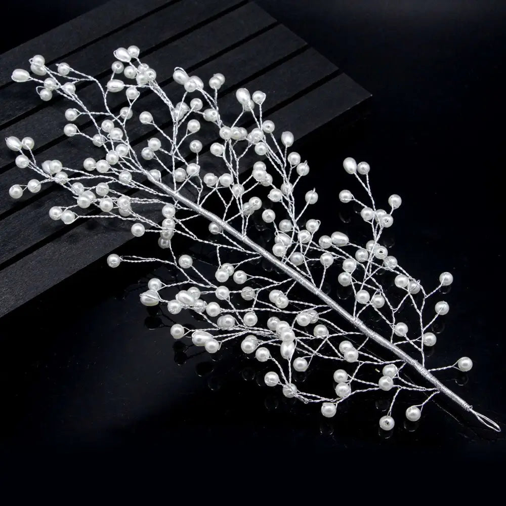 Silver wire outdoor hair comb adorned with small white pearls in a delicate gold pearl branch design for bride wedding
