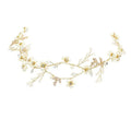 Elegant gold-toned pearl flower wedding headband with delicate white pearls and sparkling crystals in floral vine design