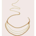 Gold-toned waist chain featuring three layered strands of faux pearls and metal links for elegant pearl jewelry accessories