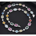 Gold plated hip-hop gemstone necklace and bracelet set with vibrant multi-colored stones in pave setting