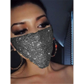 A sparkling silver flash jewelry mask adorned with dense gold rhinestone crystals for explosive metal flash style