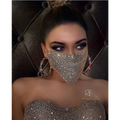 A sparkling gold rhinestone flash jewelry mask featuring an explosive metal flash design with dense crystal patterns