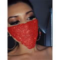 A dazzling red explosive metal flash jewelry mask with dense sparkling gold rhinestone embellishments