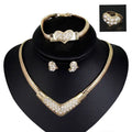 Gold-toned heart and v-shaped wedding party jewelry set with sparkling clear rhinestones for bridal wedding party