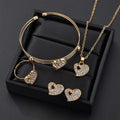 Gold rhinestone heart love jewelry set featuring a gold-toned heart necklace and bangle with sparkling rhinestones