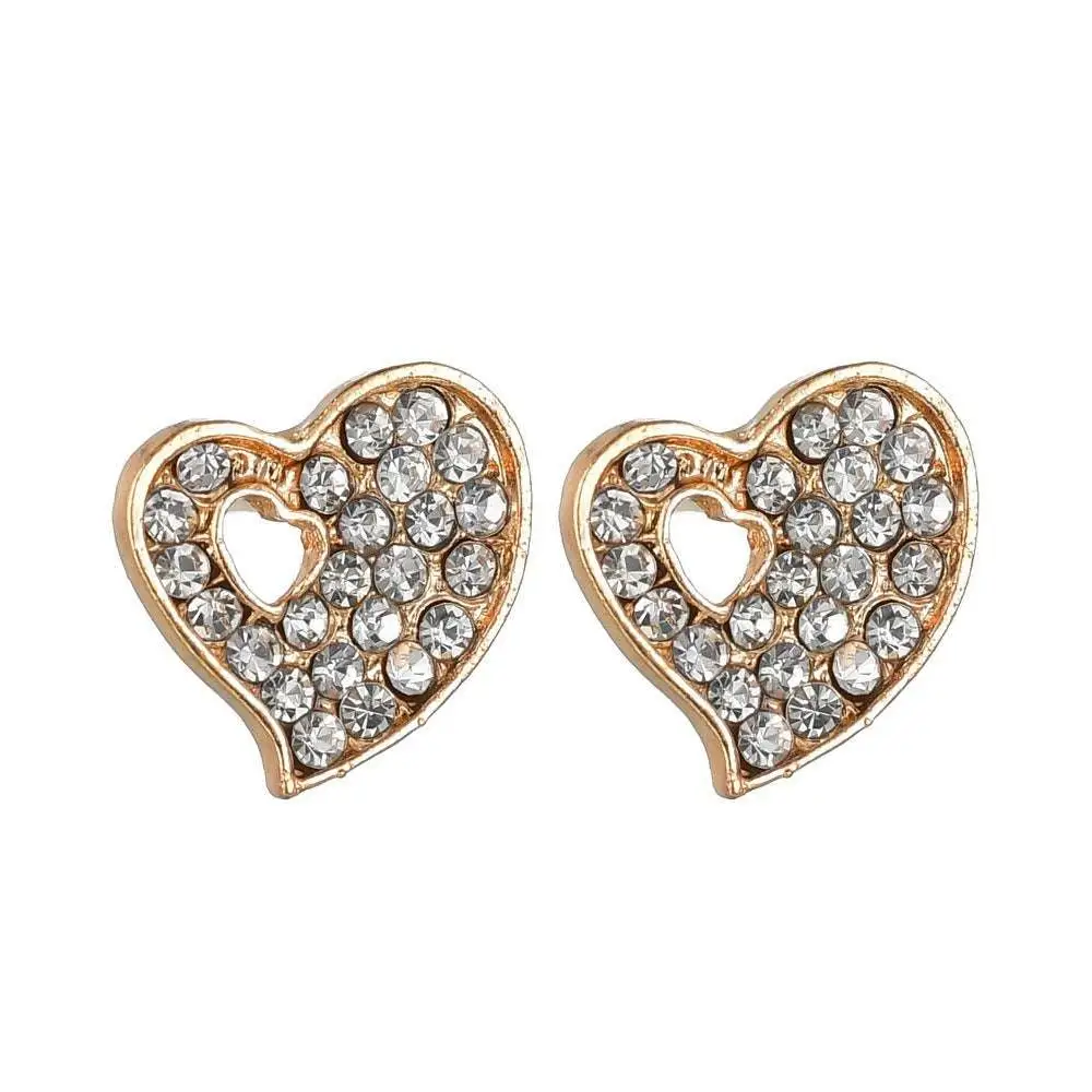 Gold heart-shaped stud earrings with clear rhinestones and a smaller heart cutout in a gold rhinestone heart love jewelry set