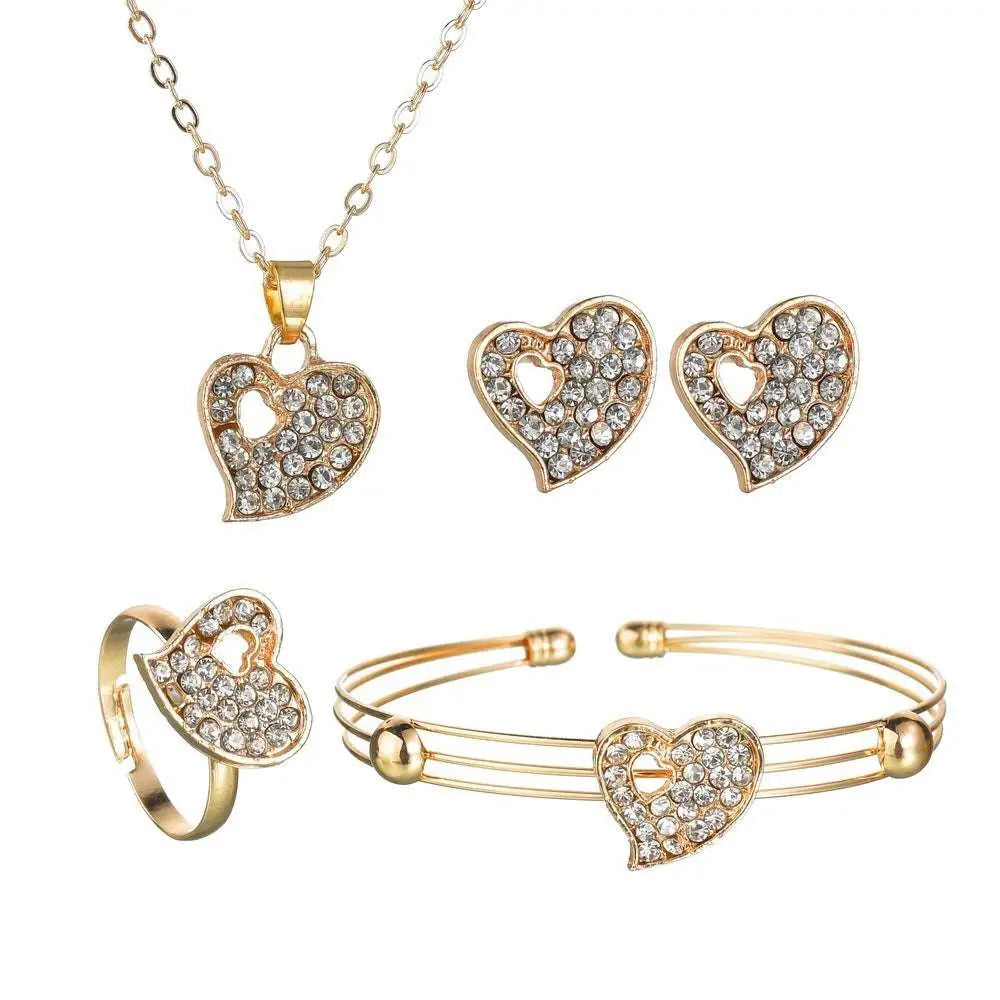 Gold rhinestone heart love jewelry set featuring gold-toned heart-shaped pieces with sparkling clear crystals