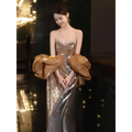 Gold sequined banquet temperament evening dress with strapless silhouette and voluminous satin puff sleeves