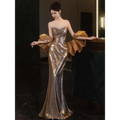 Gold sequined banquet temperament evening dress featuring a shimmering mermaid gown with voluminous sleeves