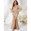Gold sequined long sleeve evening gown with high slit fishtail design perfect for formal occasions