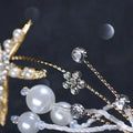 Gold-toned starfish pearl hair accessory adorned with sparkling crystals white pearls and delicate beaded chains