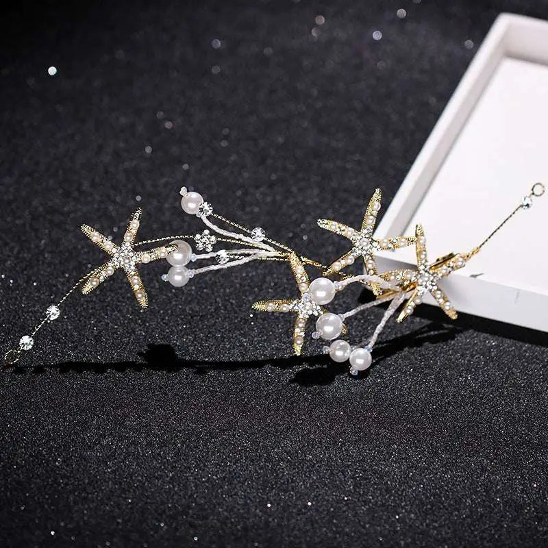 Delicate gold-toned starfish pearl hair accessory adorned with sparkling crystals and soft white pearls