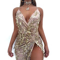 A shimmering gold v neck strap sequin dress with halter straps and a high slit for elegant occasions