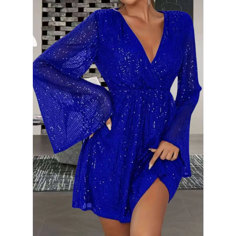 Vibrant royal blue sequin waist slimming mini dress with long bell sleeves and deep v-neckline for slimming senior party