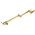 Gold wall mounted single hole kitchen faucet with gold extendable shower head and sleek metallic finish with adjustable joints