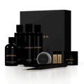 Black glass bottle with gold lettering and black cap labeled golden in golden body skin care kit beard butter