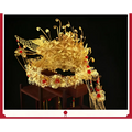 Golden ornate wedding chinese xiuhe headdress with filigree, red gemstones, floral designs, and ear clip