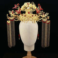 Golden ornate wedding chinese xiuhe headdress adorned with red butterflies floral motifs and dangling chain tassels with ear clip